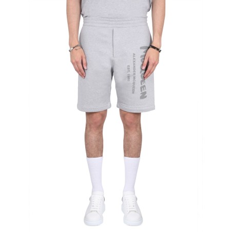 BERMUDA SHORTS WITH GRAFFITI LOGO PRINT