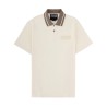 POLO CON PATCH LOGO
