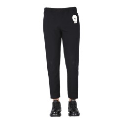 JOGGING PANTS WITH EMBROIDERED SKULL