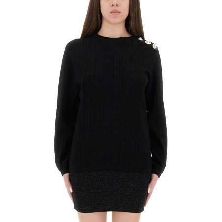 KNITTED TOPS.