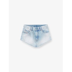 Blue denim shorts with destroyed effect