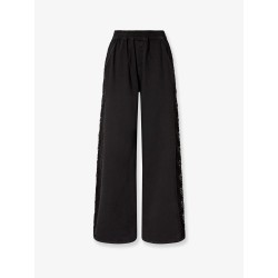Denim trousers with lace detail on the side
