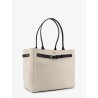 Canvas shoulder bag with engraved logo on the front