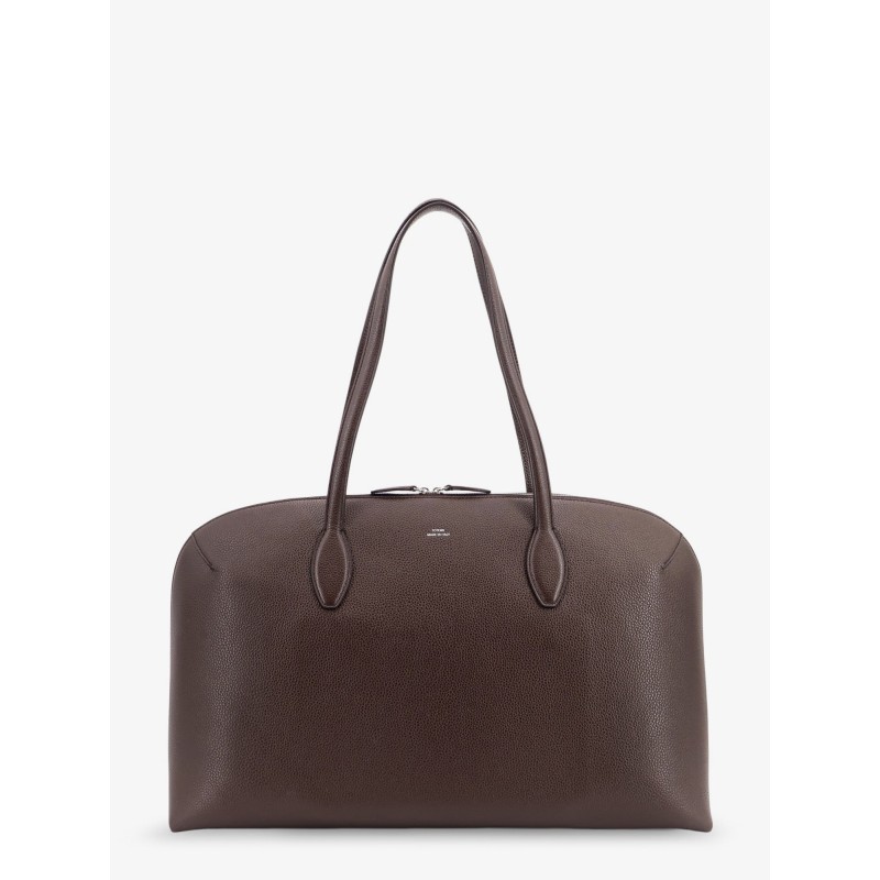 Suede handbag with engraved logo on the front