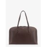 Suede handbag with engraved logo on the front