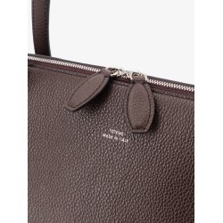 Suede handbag with engraved logo on the front