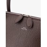 Suede handbag with engraved logo on the front