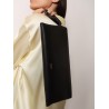 Aura leather clutch bag with lettering logo on the front