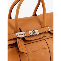 Leather travel bag with engraved logo on the front