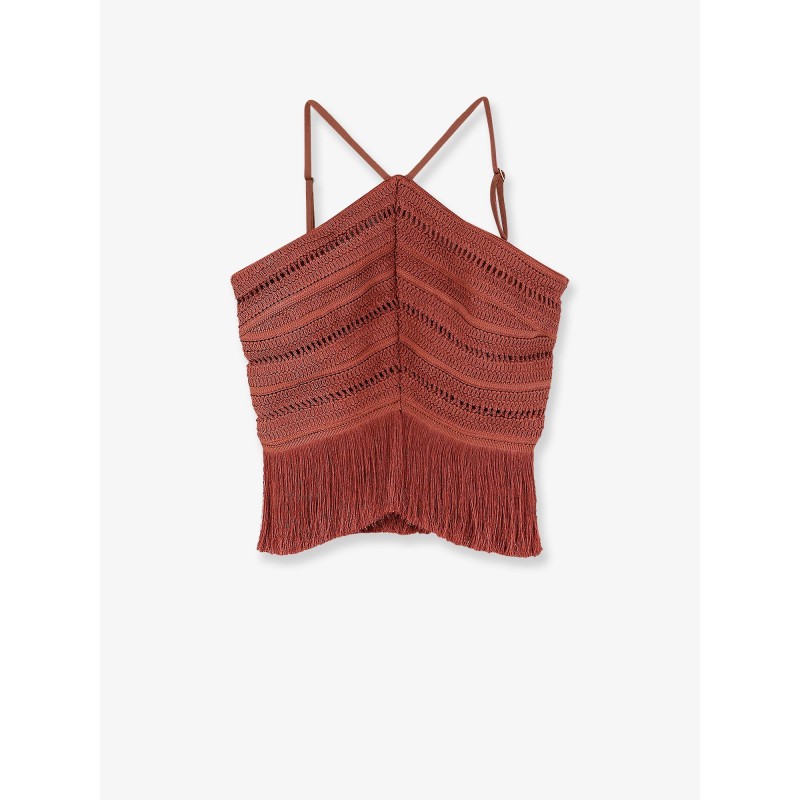 Asymmetrical top with fringes