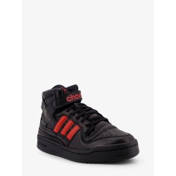 Leather sneakers with iconic logo on the side