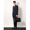 Coated canvas GG Emblem travel bag with GG motif