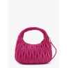 Wander matelassé suede shoulder bag