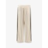Recycled nylon trousers with iconic detail on the side