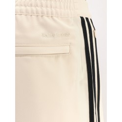 Recycled nylon trousers with iconic detail on the side