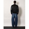 Cotton and nylon jacket with leather sleeves