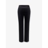 Trousers with logoed button
