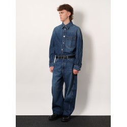 Twisted stone-washed denim jeans