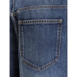 Twisted stone-washed denim jeans