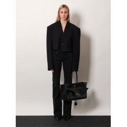 Denim trousers with frayed edges