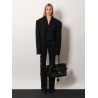 Denim trousers with frayed edges