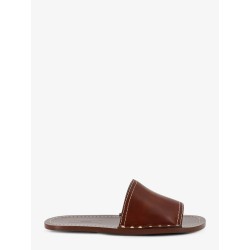 Low leather sandals with metal studs on the sides
