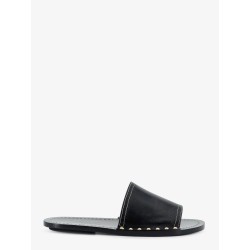 Low leather sandals with metal studs on the sides