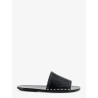 Low leather sandals with metal studs on the sides