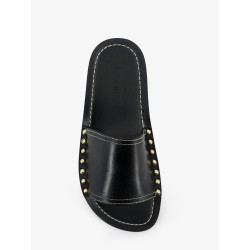 Low leather sandals with metal studs on the sides