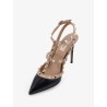 Rockstud patent leather pumps with iconic studs