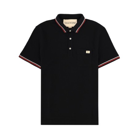 POLO CON PATCH LOGO