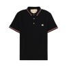 POLO CON PATCH LOGO