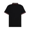 POLO CON PATCH LOGO