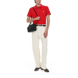 POLO CON PATCH LOGO
