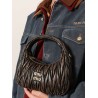 Wander quilted leather crossbody bag with a vintage effect
