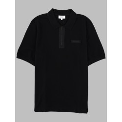 POLO CON ZIP E PATCH LOGO