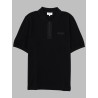 POLO CON ZIP E PATCH LOGO