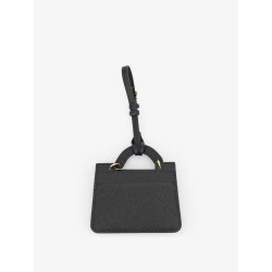 Hammered leather card holder with metal logo tag