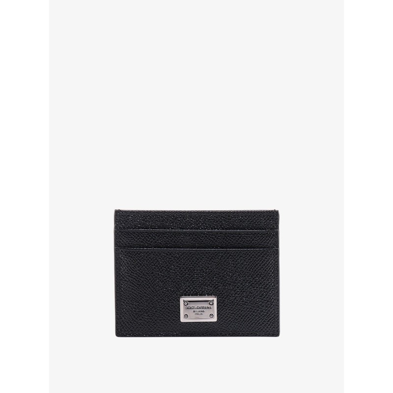 Leather card holder with metal logo tag