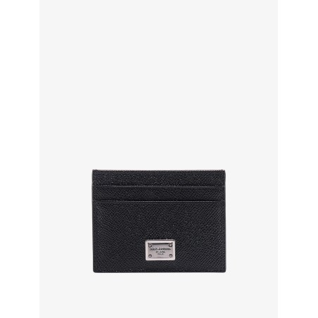 Leather card holder with metal logo tag