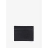 Leather card holder with metal logo tag