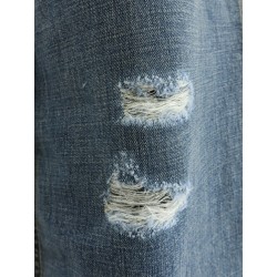 Destroyed-effect blue denim jeans