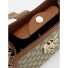 Padlock handbag with shoulder strap