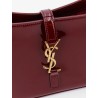 LE 5 À 7 bordeaux patent leather shoulder bag