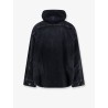 Black denim jacket with embroidered logo on the front