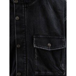Black denim jacket with embroidered logo on the front