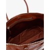 Shiny leather handbag with front lettering logo