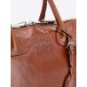 Shiny leather handbag with front lettering logo
