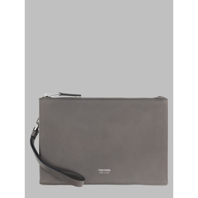 POUCHETTE MINIMAL SOTTILE IN PELLE FIORE CON CINTURINO DA POLSO