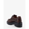 Leather lace-up with front lettering logo
